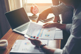 One Mid-Cap Financial Services stock  to Buy  – CWB